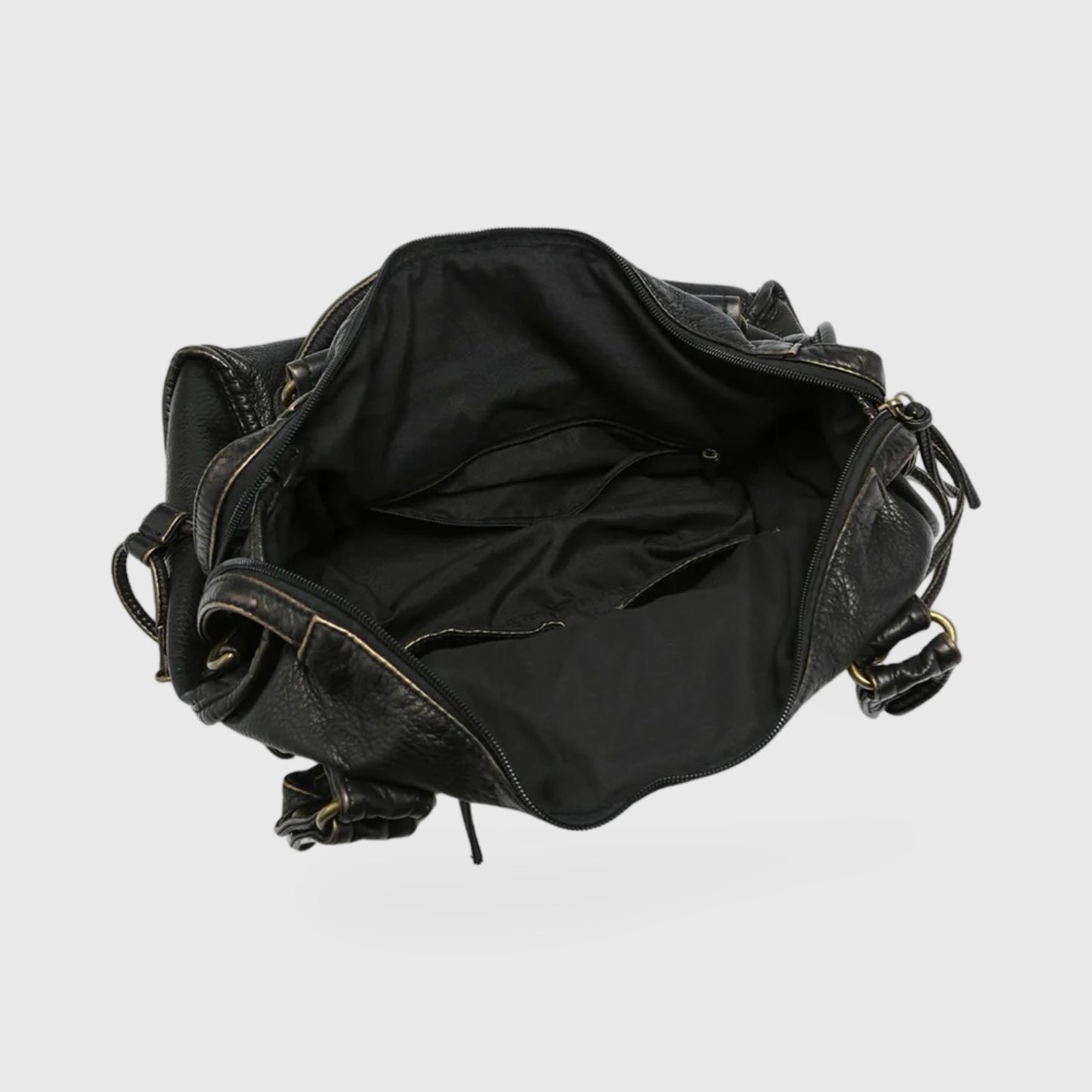 Interior view of the Celina Black Limited Edition vegan bag showcasing spacious black lining and pockets.