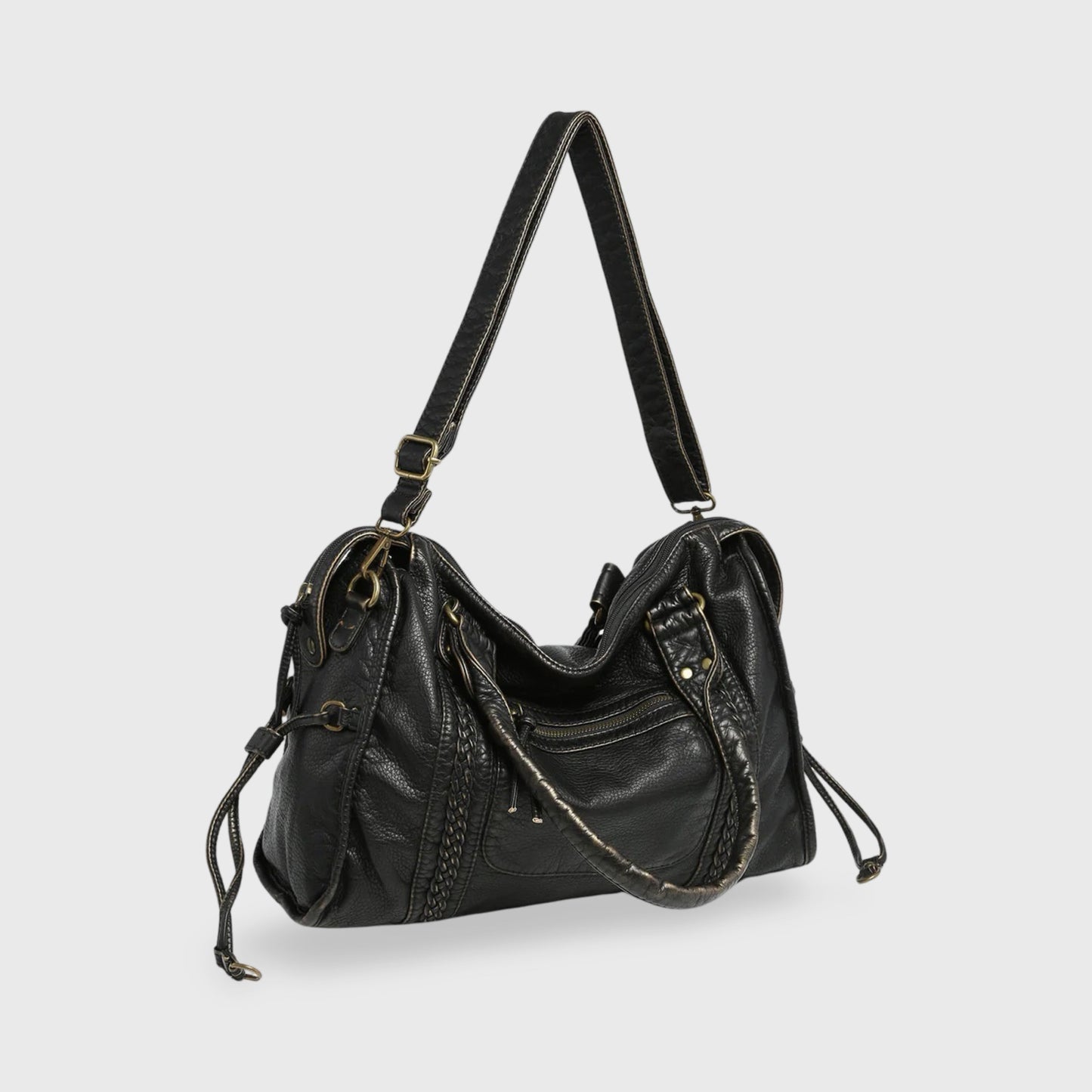 Celina  Black Limited Edition vegan bag with textured black finish and gold-tone details.