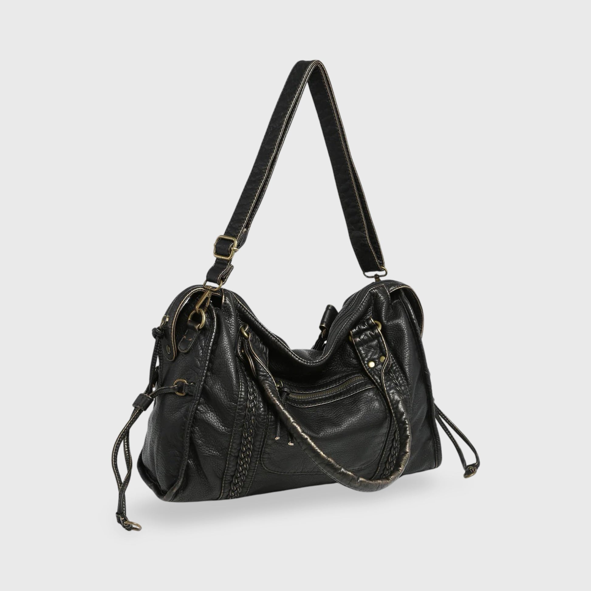 Celina  Black Limited Edition vegan bag with textured black finish and gold-tone details.