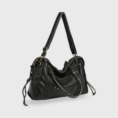 Celina  Black Limited Edition vegan bag with textured black finish and gold-tone details.